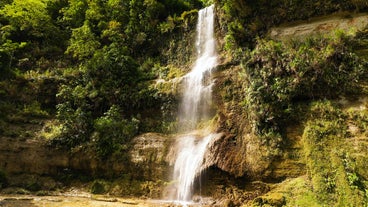 The scenic view of Can-umantad Falls, a highlight of your tour on Bohol Island