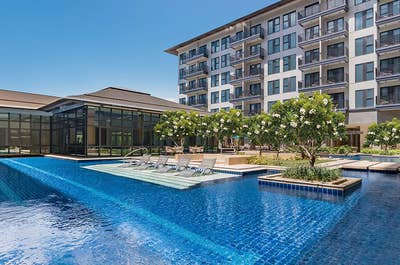 Facade of DusitD2 Hotel with pool at Davao