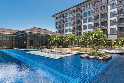 Facade of DusitD2 Hotel with pool at Davao