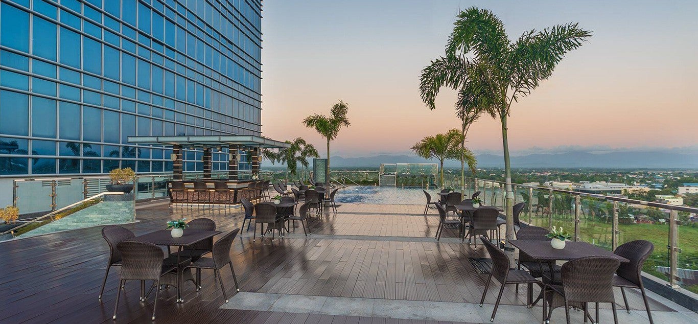 Dive into the outdoor sswimming pool of Richmonde Hotel with picturesque skyline views, the pool area offers a refreshing resort vibe in the heart of the city