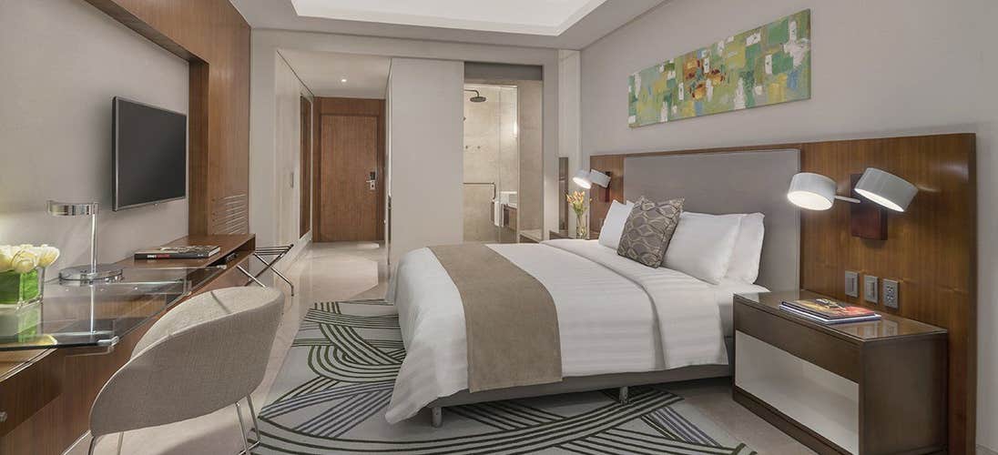 Stay at the Deluxe Room of  Richmonde Hotel in Iloilo for your quick and memorable tour!