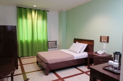 Relax at the Standard Room of The Inns by the Oriental Bacolod