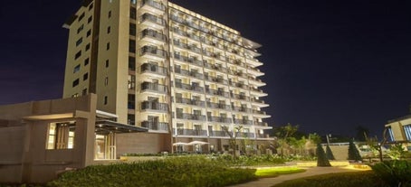 The facade of Quest Hotel, where you will spend your staycation package in Tagaytay City