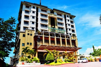 Check in at the Pinnacle Hotel and Suites, Davao