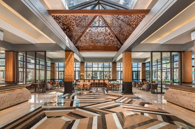 Enjoy the view of the lobby of Dusit D2 Hotel Davao before you check out