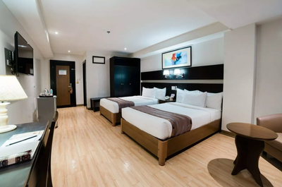 Have a cozy stay at the Superior room of the Pinnacle Hotel and Suites