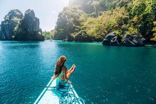 A traveler on a boat in El Nido, Palawan