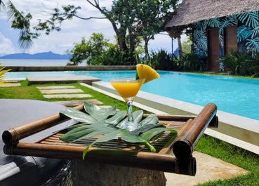 Have a sip of your new favorite drink while chilling at the pool side of Buko Beach Resort El Nido Palawan