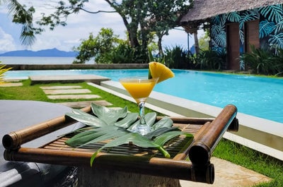 Have a sip of your new favorite drink while chilling at the pool side of Buko Beach Resort El Nido Palawan