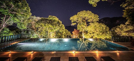 Enjoy your free time by the pool at Karuna El Nido Villas with your Palawan resort package