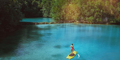 Paddle boarding in Sugba Lagoon, Siargao