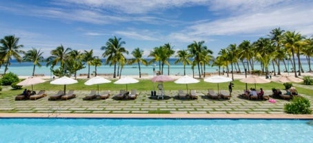 Enjoy the pool and the beach at Bohol Beach Club