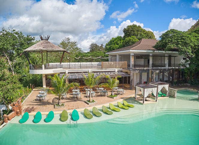 Outdoor lagoon pool at TAG Resort Coron, Palawan