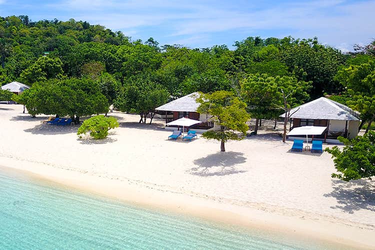 Pristine white sand beach of Club Paradise Coron, Palawan