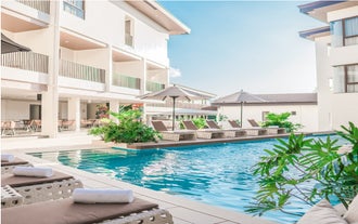 A poolside view at Charlie's Resort, an ideal place to relax on this 3-day, 2-night tour package to El Nido town