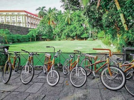 Eco-friendly bicycles neatly lined up, ready for this bamboo bike tour in Intramuros old town