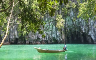 Boat used for the Puerto Princesa Underground River tour in Palawan Island, cruising near the entrance