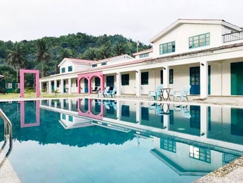 Pool and facade of rooms at Lazuli Resort, San Vicente, Palawan