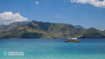 Enjoy a picturesque boat ride during your island hopping tour in Zambales Province.
