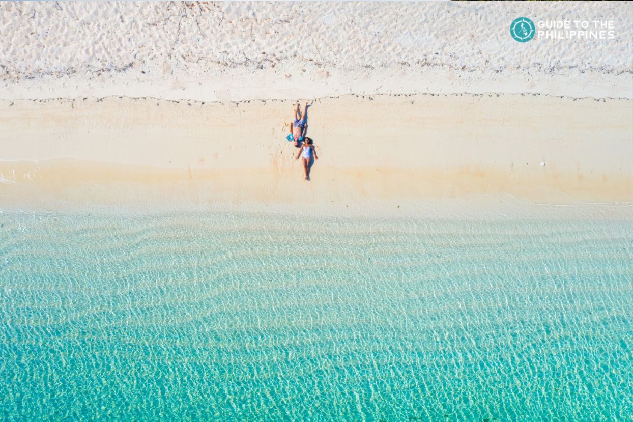 Couple on a beach in Coron