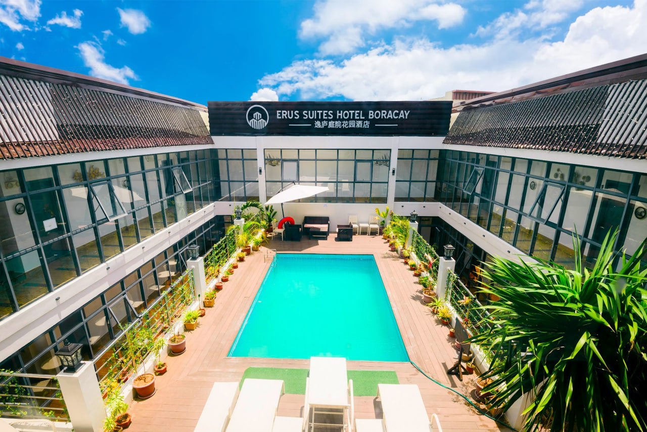 With this affordable travel package in the Philippines, you can enjoy Erus Suites’ amenities, including a swimming pool.
