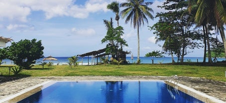 Outdoor pool overlooking the long beach at Lazuli Resort, San Vicente, Palawan
