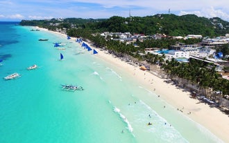 Boracay Island's White Beach, known for its fine white sand and clear waters.