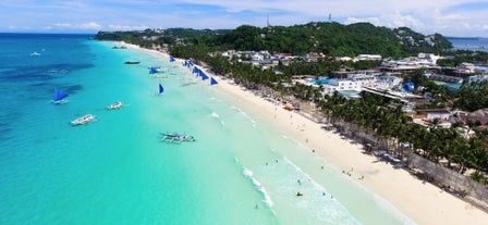 Boracay Island's White Beach, known for its fine white sand and clear waters.