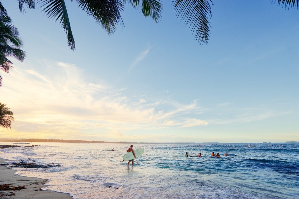 Surfers in Siargao