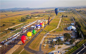 A stunning aerial view of the Philippine International Hot Air Balloon Festival Package in New Clark City.