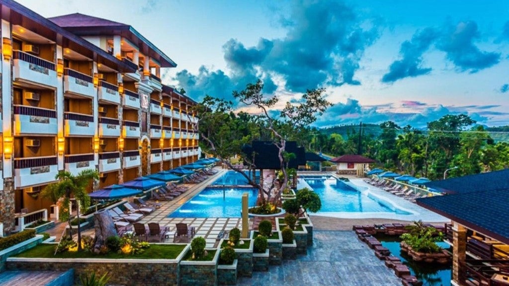 Coron Westown Resort's inviting pool area is included in this 3-day, 2-night Palawan Island package