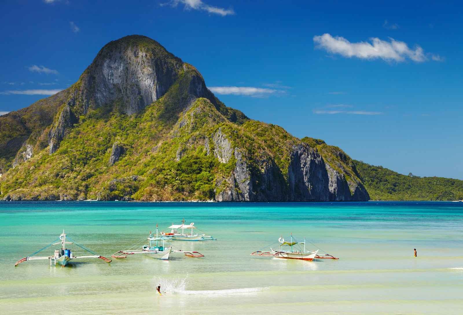 Visit Cadlao Island’s pristine shores and crystal-clear lagoons during this tour package to El Nido and Coron Towns with airfare.