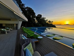 Relax by the pool of Lime Resort with this El Nido town tour package