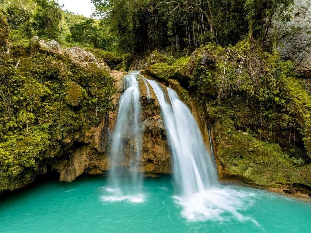 This tour to Kawasan Falls and Moalboal town offers an unforgettable adventure with crystal-clear waters and lush scenery.