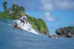 Learn how to surf in Siargao