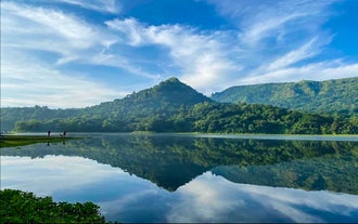 Discover the lush landscapes and serene waters of Lake Mapanuepe during this camping tour package.