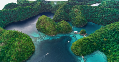 A serene view of Sugba Lagoon, a must-visit spot on this land tour on Siargao Island