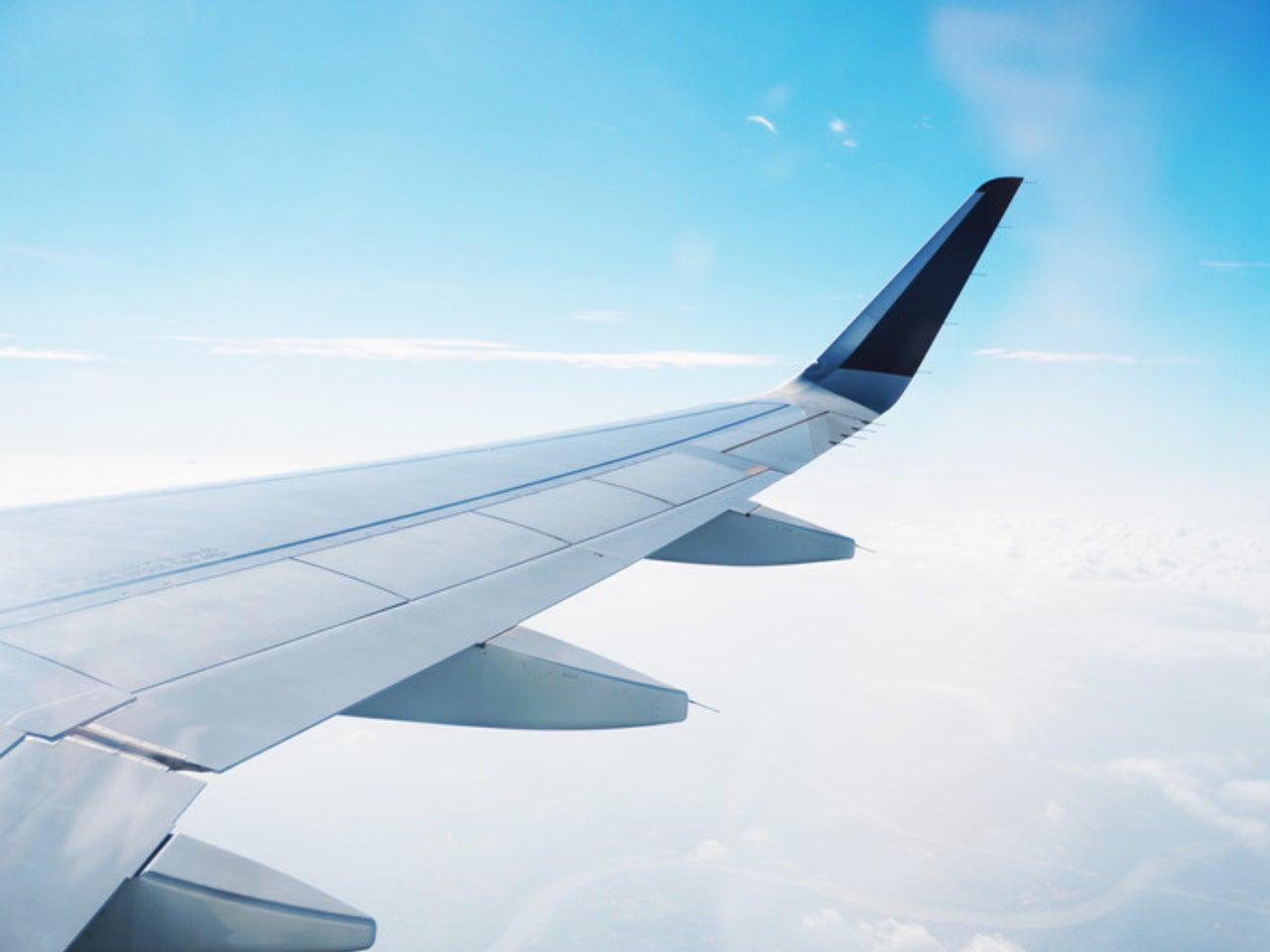 A plane going to Dakak Beach Resort