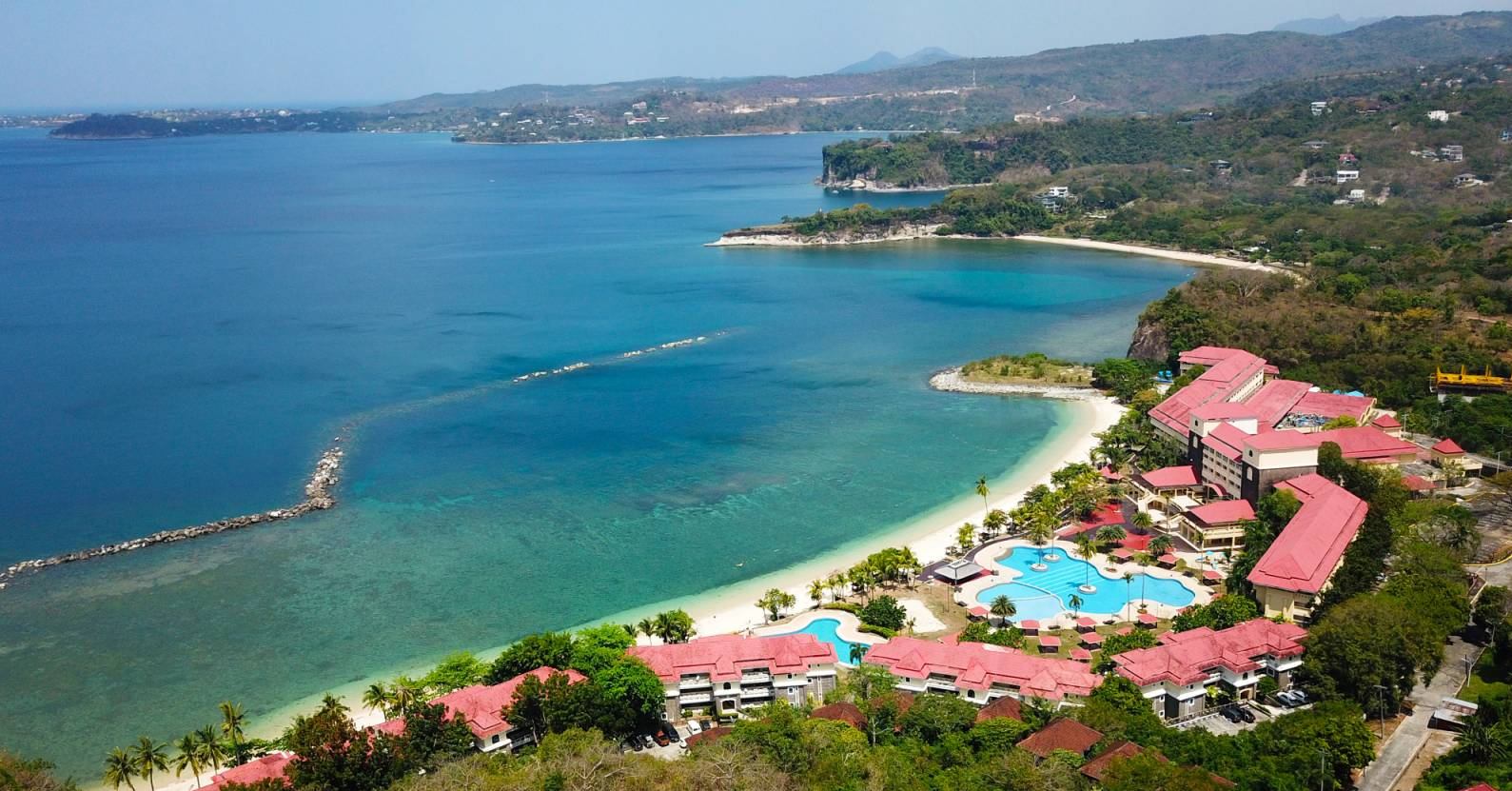 An aerial view of the stunning shores and amenities of Canyon Cove Resort in Batangas Province.