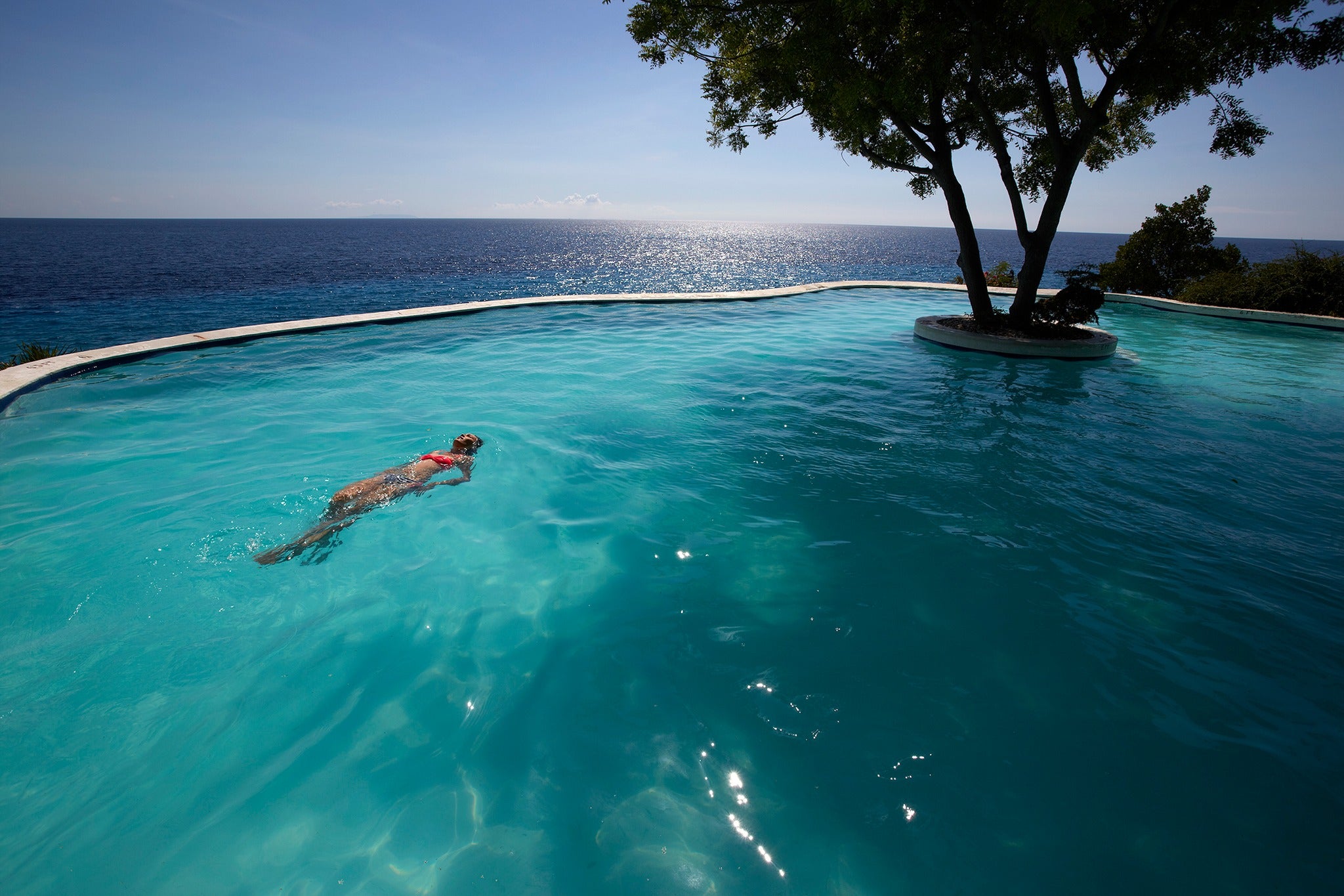 Enjiy a relaxing swim at Bluewater Sumilon Island Resort