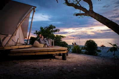 Have a comfortable overnight stay in a glamping tent in Bluewater Sumilon in Cebu