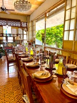 Travel back in time when you visit Camiña Balay nga Bato on this private Iloilo City food tour