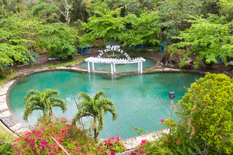 Camiguin Tour to Top Land Attractions with Transfers | Sunken Cemetery, Hot and Cold Springs & Falls