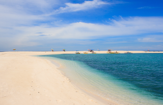 Camiguin Island Hopping Tour to White Island, Katunggan Park & Mantigue Island with Transfers