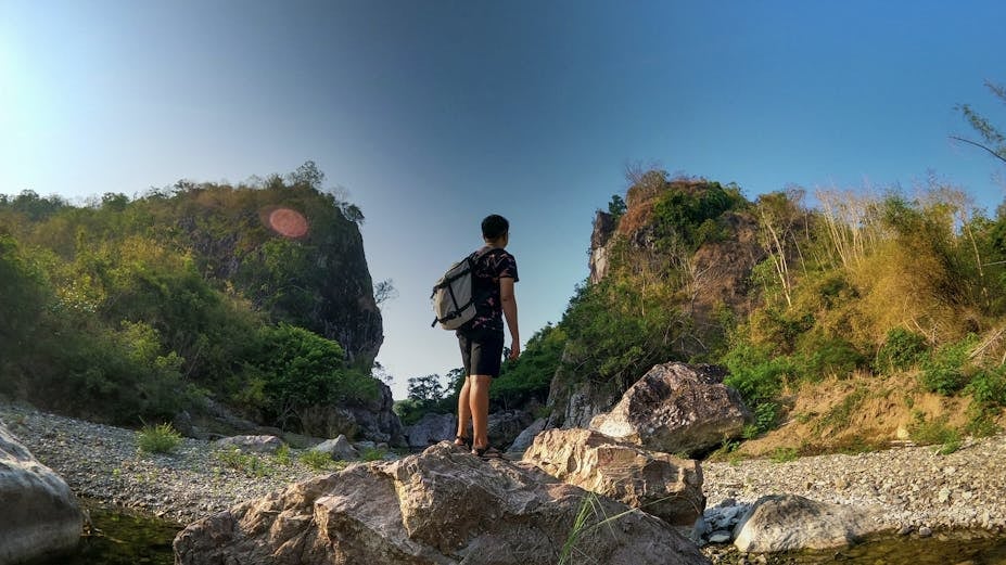A hiker on the rocky trail during this beginner hike in Mt. Manalmon and Mt. Matinik near Manila City