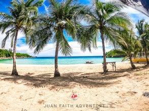 The quiet shoreline of Laki Beach, as seen on this Bataan Province day tour from Manila City