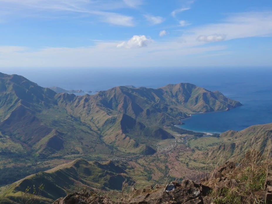 Trek through the rugged trails of the Cawag Hexa day hike with panoramic mountain views.