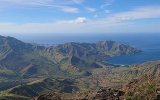 Trek through the rugged trails of the Cawag Hexa day hike with panoramic mountain views.