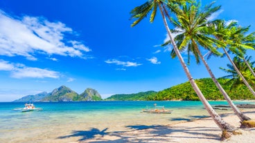 A tropical beach in Palawan Island, a perfect spot to explore during this 3-day, 2-night tour package to El Nido town