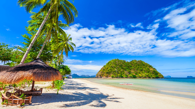 Soak in the beauty of Shimizu Island’s unspoiled beach during your tour package to Puerto Princesa City and El Nido Town on Palawan Island.